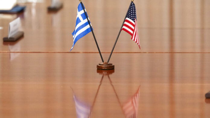 ap-greece-usa-flag.jpg